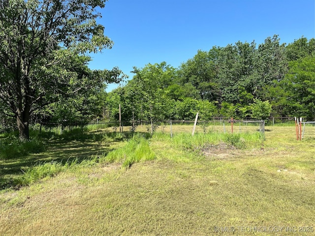 40821 N 3956th Dr, Skiatook, OK 74070 - view of tree filled area