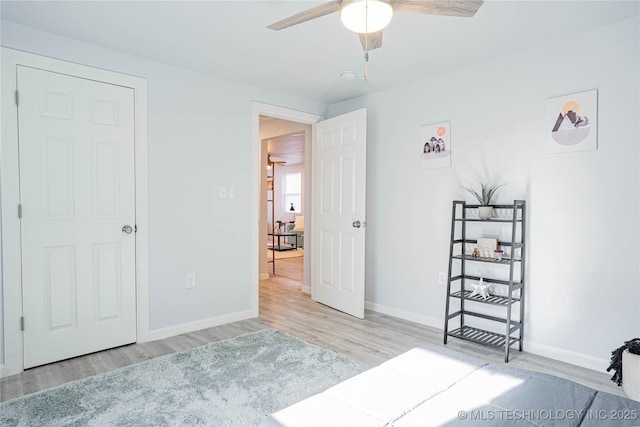 2017 N Quaker Ave, Tulsa, OK 74106 - bedroom with wood finished floors, baseboards, and ceiling fan