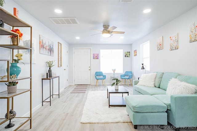 2017 N Quaker Ave, Tulsa, OK 74106 - living area featuring light wood-style floors, ceiling fan, recessed lighting, and baseboards
