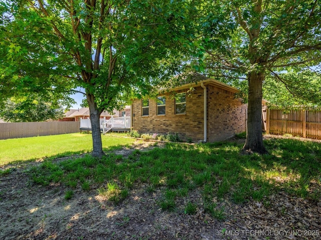 1912 Lester Ave, Bartlesville, OK 74006 - view of yard featuring a wooden deck