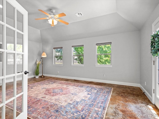1912 Lester Ave, Bartlesville, OK 74006 - empty room with lofted ceiling, ceiling fan, baseboards, and french doors