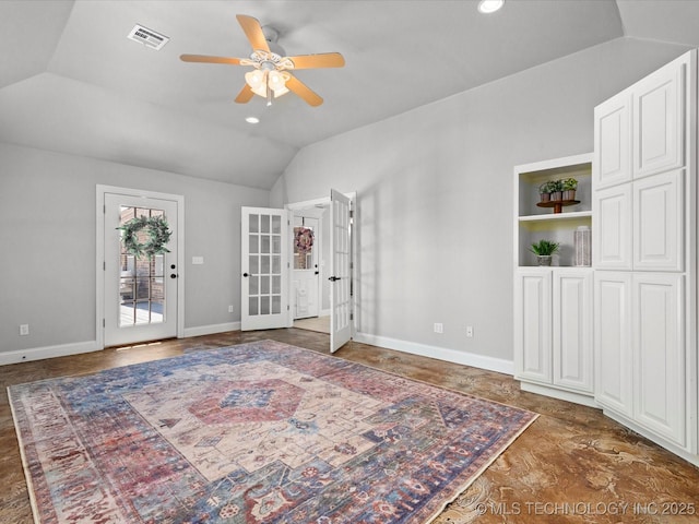 1912 Lester Ave, Bartlesville, OK 74006 - spare room featuring a ceiling fan, french doors, vaulted ceiling, baseboards, and recessed lighting