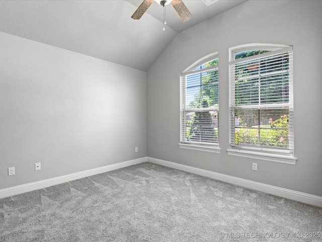 1912 Lester Ave, Bartlesville, OK 74006 - carpeted spare room featuring ceiling fan, vaulted ceiling, and baseboards