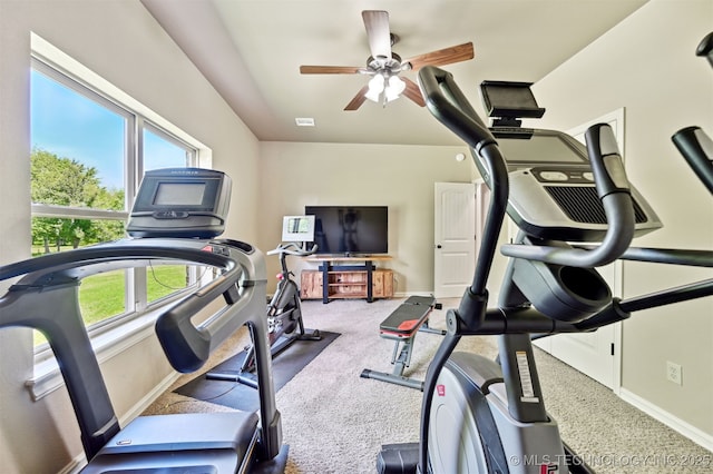 workout area featuring ceiling fan, carpet flooring, and baseboards