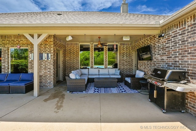 view of patio featuring outdoor lounge area and a grill