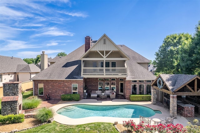4501 E 108th Pl, Tulsa, OK 74137 - outdoor pool featuring an outdoor living space and a patio