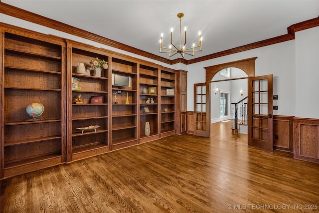 4501 E 108th Pl, Tulsa, OK 74137 - unfurnished room with dark wood-style flooring, a chandelier, ornamental molding, wainscoting, and french doors