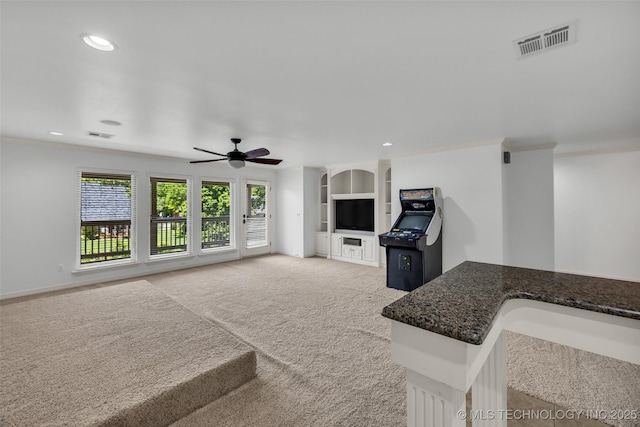 4501 E 108th Pl, Tulsa, OK 74137 - living area with light colored carpet, a ceiling fan, and recessed lighting