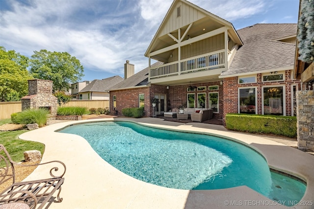 4501 E 108th Pl, Tulsa, OK 74137 - view of pool with an outdoor living space with a fireplace, a patio area, and fence