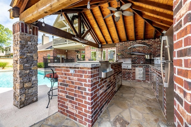 4501 E 108th Pl, Tulsa, OK 74137 - view of patio with exterior kitchen, a ceiling fan, and a gazebo
