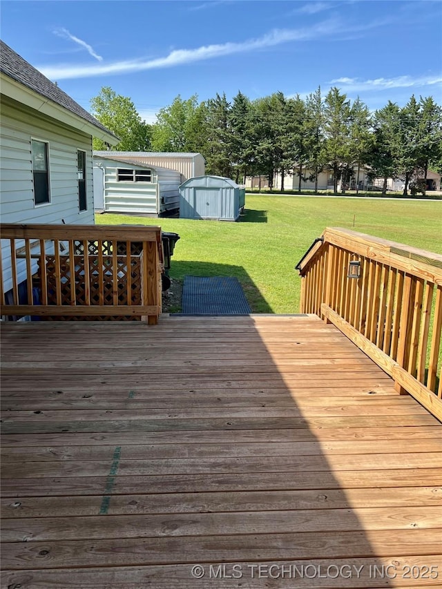 7944 Restful Ln, Kingston, OK 73439 - wooden terrace with a shed, a yard, and an outbuilding