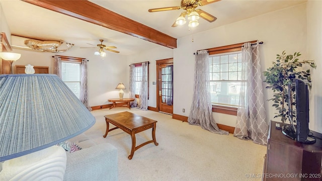 209 S Vine Ave, Cleveland, OK 74020 - bedroom featuring multiple windows, baseboards, beamed ceiling, and access to outside