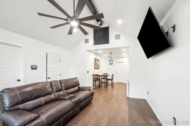 610 E 4th Ave, Bristow, OK 74010 - living area with a ceiling fan, beamed ceiling, high vaulted ceiling, dark wood-type flooring, and recessed lighting