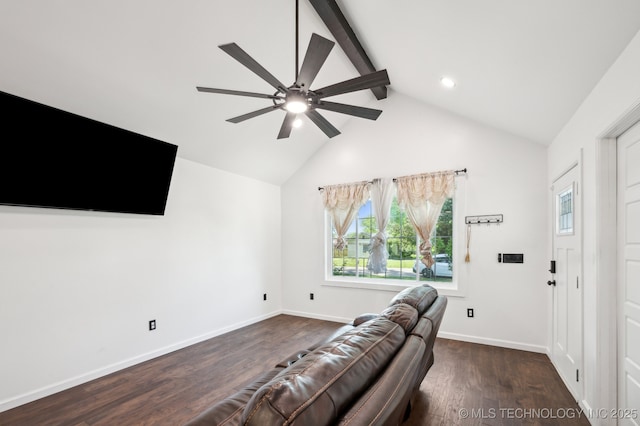 610 E 4th Ave, Bristow, OK 74010 - living room featuring beamed ceiling, healthy amount of natural light, a ceiling fan, dark wood-type flooring, and baseboards