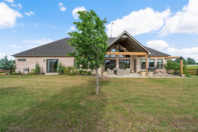 16990 S 33rd W Ave, Glenpool, OK 74033 - rear view of property with brick siding, a patio, a lawn, and an outdoor living space