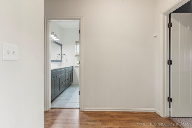 16990 S 33rd W Ave, Glenpool, OK 74033 - hall featuring light wood-style floors and baseboards