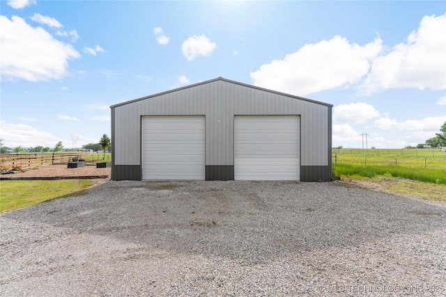 16990 S 33rd W Ave, Glenpool, OK 74033 - detached garage featuring fence and a view of countryside