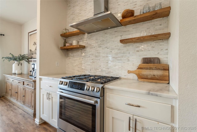 16990 S 33rd W Ave, Glenpool, OK 74033 - kitchen featuring open shelves, stainless steel gas range oven, wall chimney exhaust hood, backsplash, and light wood-style floors