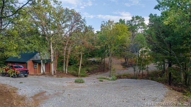 2689 Chickasaw Trl, Davis, OK 73030 - view of yard with an outbuilding