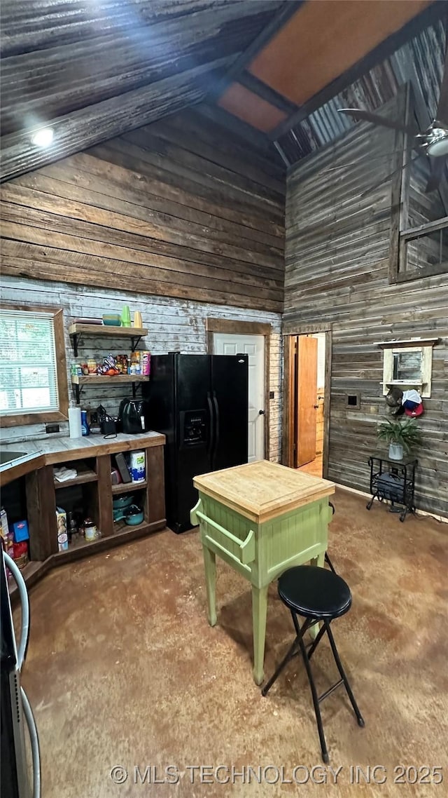2689 Chickasaw Trl, Davis, OK 73030 - interior space featuring concrete flooring and vaulted ceiling