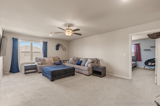 10104 S 227th E Ave, Broken Arrow, OK 74014 - carpeted living room with ceiling fan and baseboards
