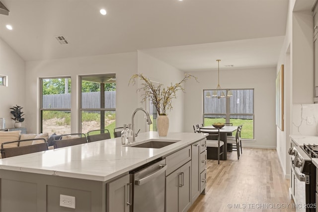 1331 N Beech St, Broken Arrow, OK 74012 - kitchen featuring stainless steel appliances, gray cabinets, a sink, light wood finished floors, and recessed lighting