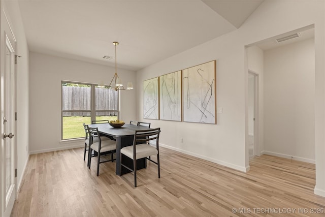 1331 N Beech St, Broken Arrow, OK 74012 - dining area with light wood-type flooring, baseboards, and a chandelier