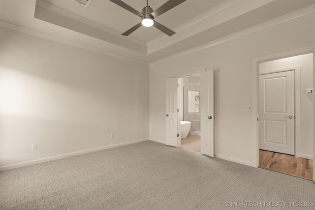 1331 N Beech St, Broken Arrow, OK 74012 - unfurnished bedroom featuring carpet floors, a raised ceiling, baseboards, crown molding, and connected bathroom