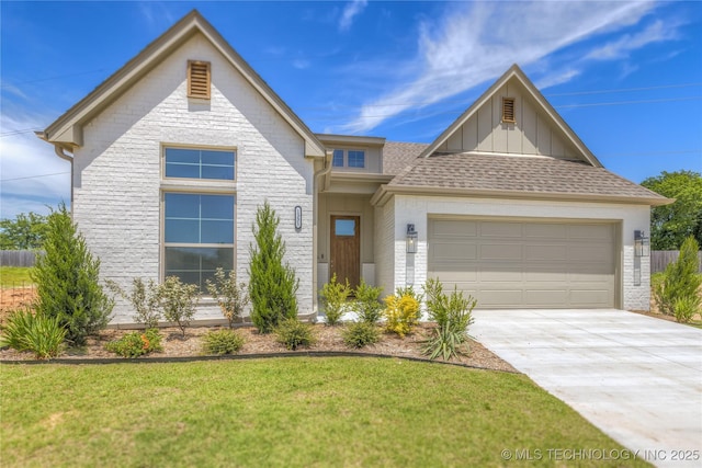 1331 N Beech St, Broken Arrow, OK 74012 - view of front of property featuring driveway, a garage, a front yard, brick siding, and board and batten siding