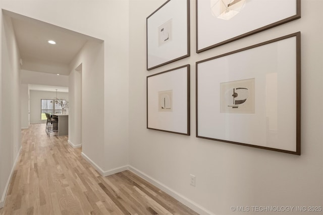 1331 N Beech St, Broken Arrow, OK 74012 - corridor featuring light wood-style flooring, baseboards, a chandelier, and recessed lighting