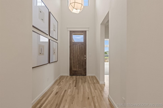 1331 N Beech St, Broken Arrow, OK 74012 - foyer with light wood-style floors, baseboards, and a towering ceiling