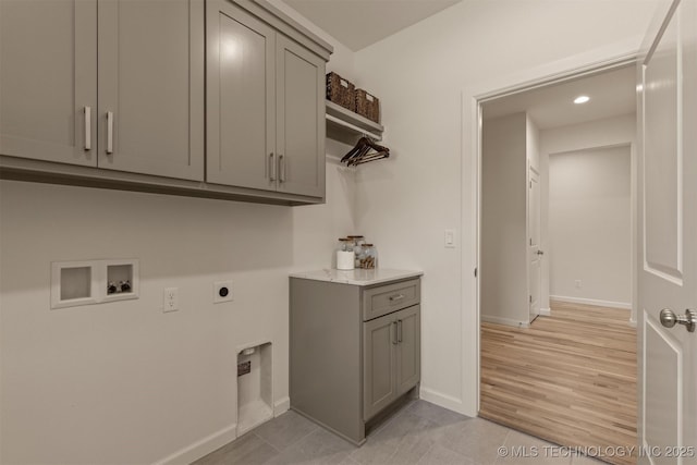 1331 N Beech St, Broken Arrow, OK 74012 - laundry room with hookup for a washing machine, hookup for an electric dryer, cabinet space, baseboards, and recessed lighting