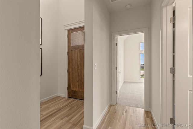 1331 N Beech St, Broken Arrow, OK 74012 - hallway with light wood-type flooring and baseboards
