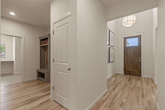 1331 N Beech St, Broken Arrow, OK 74012 - foyer with light wood finished floors, healthy amount of natural light, baseboards, and recessed lighting