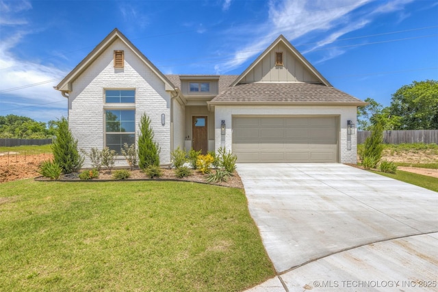 1331 N Beech St, Broken Arrow, OK 74012 - view of front of house with brick siding, driveway, an attached garage, and board and batten siding