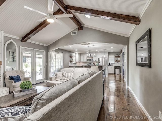 living room with arched walkways, dark wood-type flooring, ceiling fan, baseboards, and recessed lighting