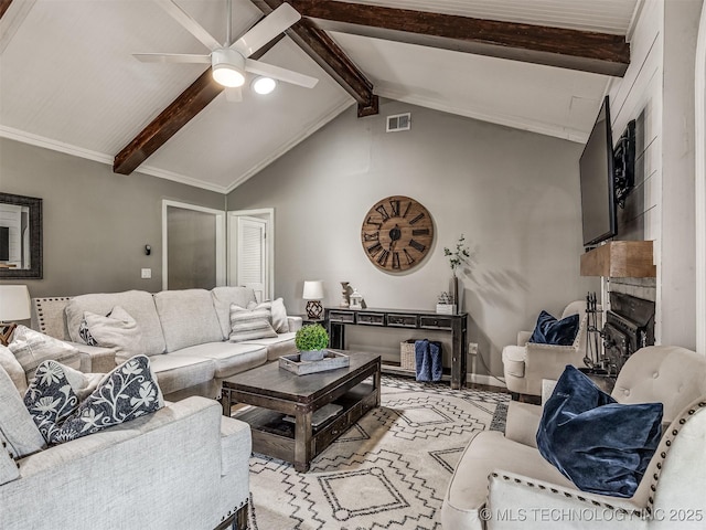 living room with a fireplace, ceiling fan, and baseboards