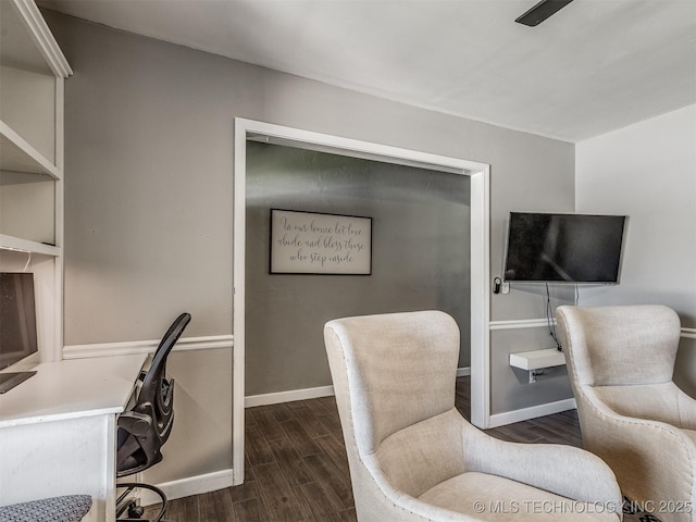 office area with dark wood-style floors and baseboards
