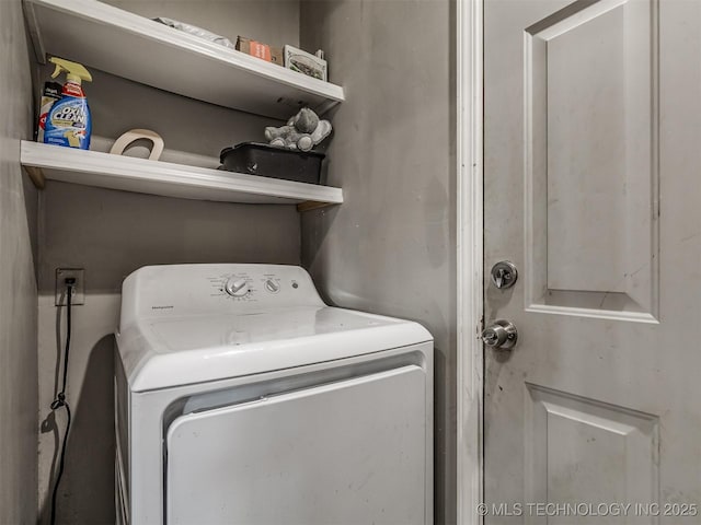 laundry room featuring washer / dryer