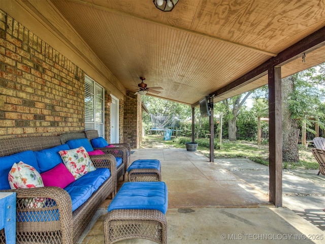 view of patio featuring a ceiling fan and an outdoor hangout area