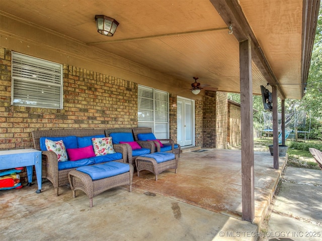 view of patio featuring outdoor lounge area and ceiling fan