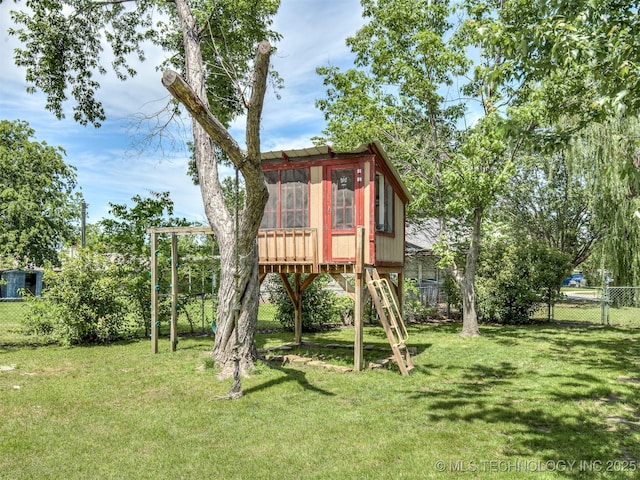 view of jungle gym with exterior structure and an outbuilding