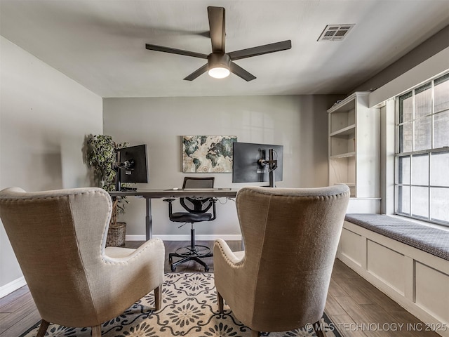home office featuring ceiling fan and wood finished floors