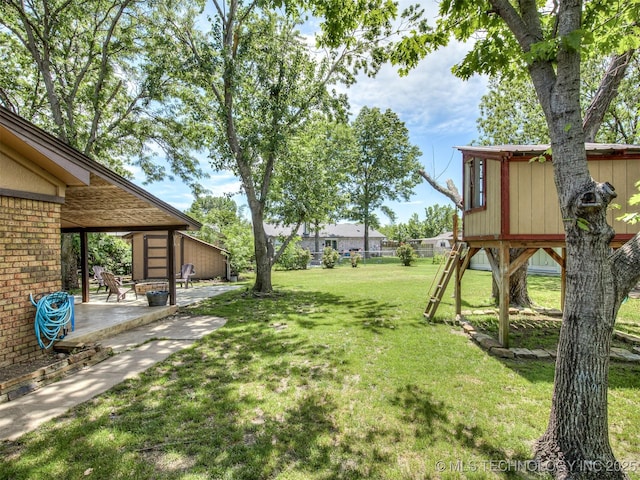 view of yard with a patio