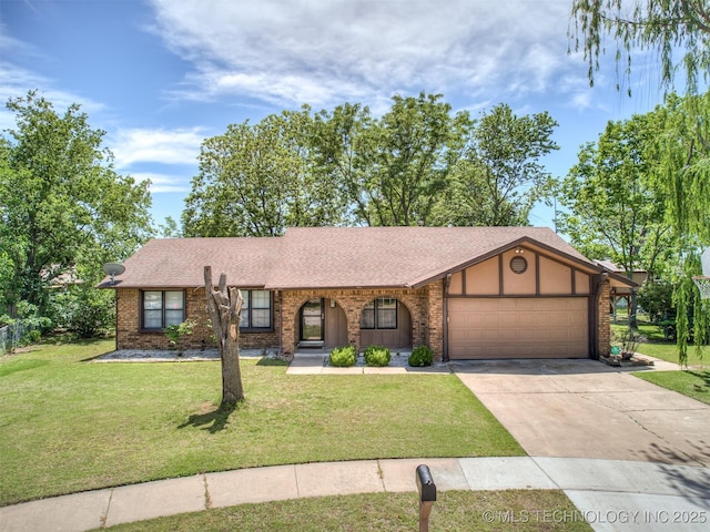 view of front facade with a garage, a front lawn, driveway, a shingled roof, and brick siding