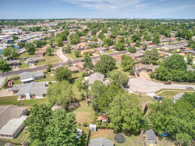 aerial view of property's location featuring nearby suburban area