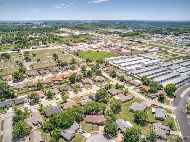 aerial view of property's location with nearby suburban area