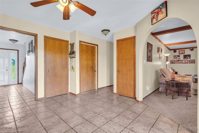 2750 Enterprise, Lone Grove, OK 73401 - entryway featuring baseboards, arched walkways, a ceiling fan, and light tile patterned floors
