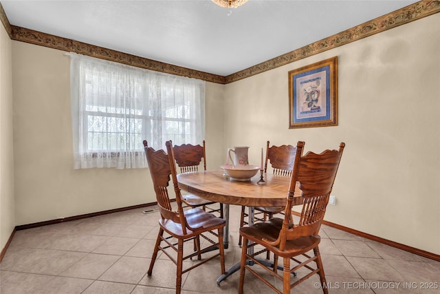 2750 Enterprise, Lone Grove, OK 73401 - dining room featuring light tile patterned flooring and baseboards