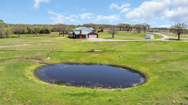 2750 Enterprise, Lone Grove, OK 73401 - view of property's community with driveway, a rural view, a garage, a water view, and an outdoor structure